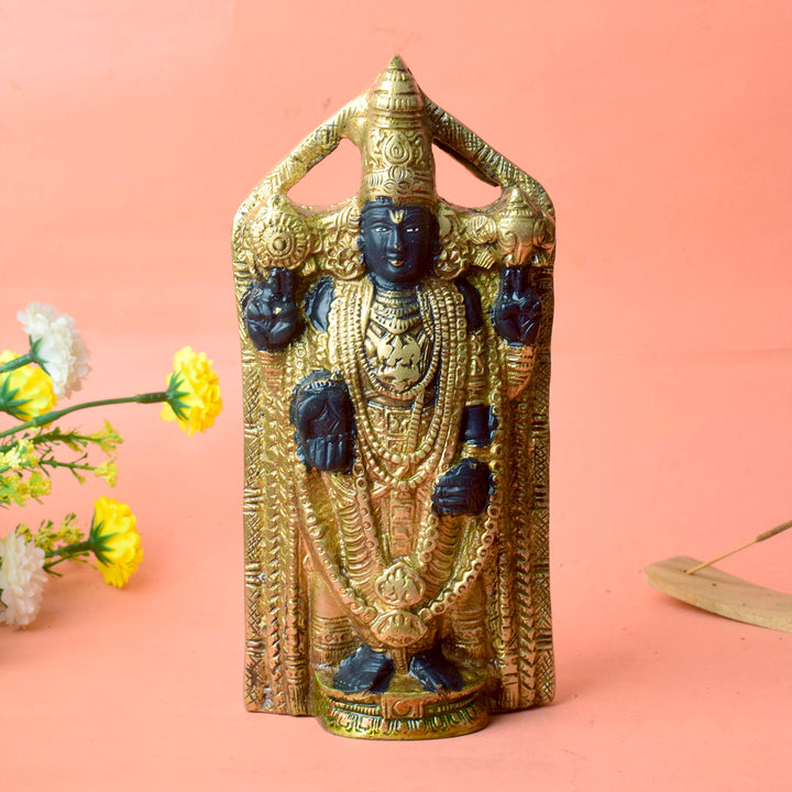 This 8-inch Tirupati Balaji statue beautifully captures the divine presence of Lord Venkateshwara, the beloved deity of the Tirupati temple. Crafted with exquisite attention to detail, the statue radiates grace, serenity, and spiritual blessings. Known for his power to bestow prosperity, health, and peace, Lord Balaji's idol brings a sense of calm and positive energy to any space.