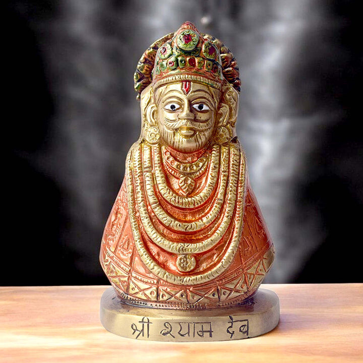 This Khatu Shyam idol is a symbol of divine grace, devotion, and spiritual protection. Crafted with exquisite detail, it beautifully captures the serene expression of Lord Khatu Shyam, a revered deity known for bestowing blessings of prosperity, health, and happiness upon his devotees.