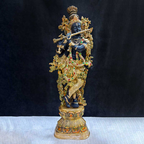 Brass Idol of 28 Inch Brass Krishna Sculpture with Artistic Detailing. Elevate your space with the majestic 28-inch Brass Krishna Sculpture, designed with exquisite artistic detailing. This grand piece beautifully depicts Lord Krishna in a graceful and serene posture, showcasing intricate craftsmanship that highlights every delicate feature.  India's Largest Puja Accessories Brand - Satvik