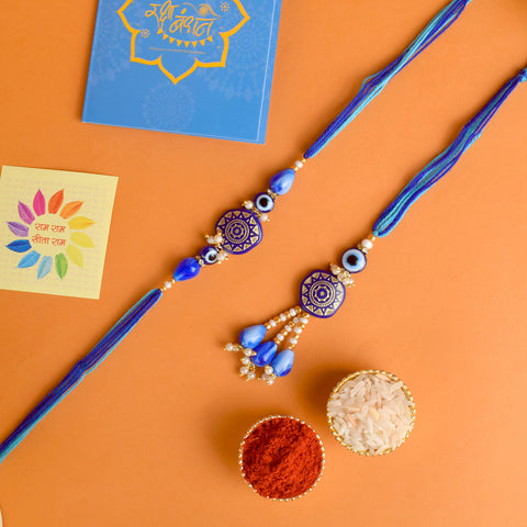 Designer Couple Rakhi Set for Bhaiya and Bhabhi with Roli Chawal and Ram Sita Stickers – Raksha Bandhan Gift Combo. India’s Largest Brass Idols Brand - www.satvikstore.in