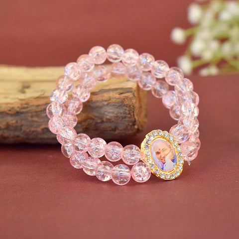 Pink Shiny Beads Double Layer Guruji Swaroop Bracelet featuring two layers of delicate pink beads and Jai Guruji Swaroop – perfect for spiritual wear, festive gifting, and daily devotion. India’s Largest Pooja Accessories Brand – www.satvikstore.in