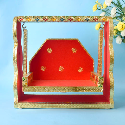 Red Velvet and Meenakari handcrafted Laddu Gopal Jhula with ornate design, ideal for Bal Gopal during Janmashtami and pooja rituals. India’s Largest Pooja Accessories Brand – www.satvikstore.in